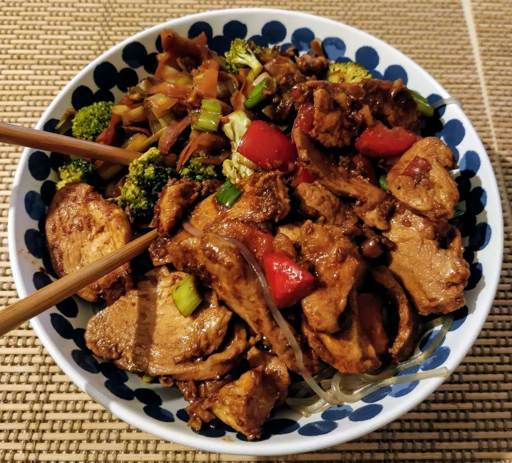 A version of the stir fry with peppers and glass noodles