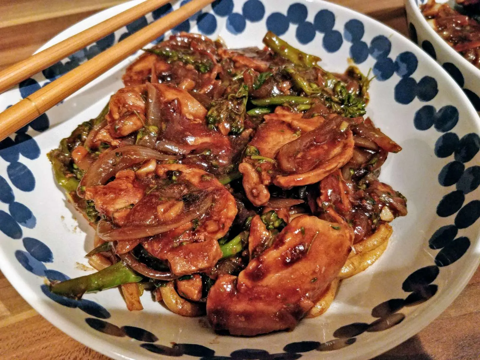 Satay pork and tenderstem broccoli over udon noodles